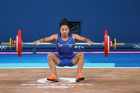 Mirabai Chanu competes during the snatch stage of the women's 49kg weightlifting event 